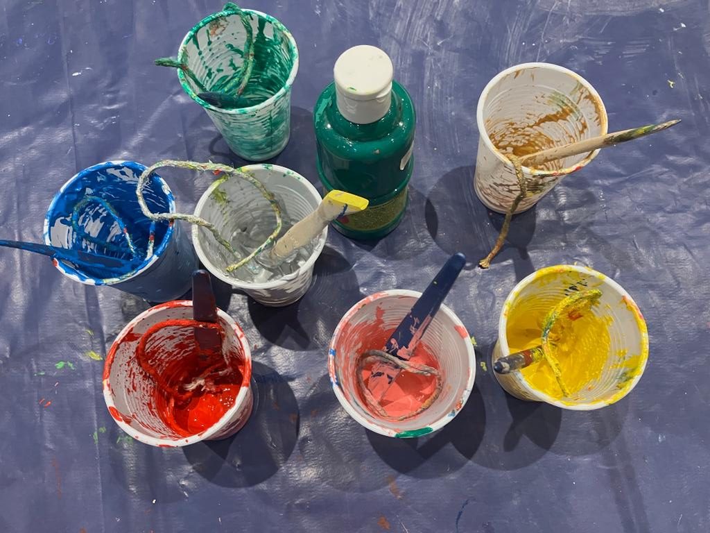 Paints on a table