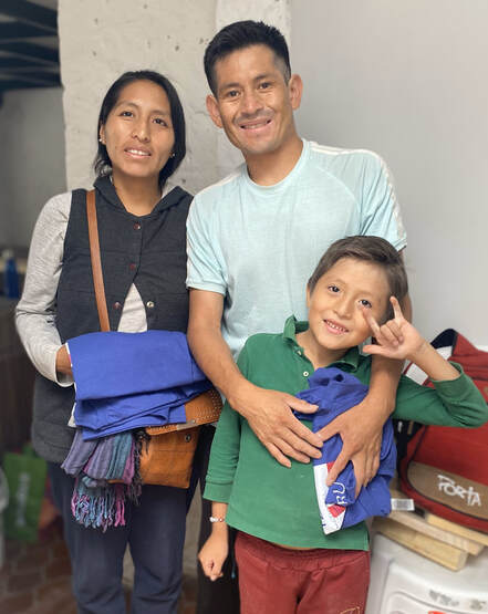 Joel, Ivette and their son in Peru