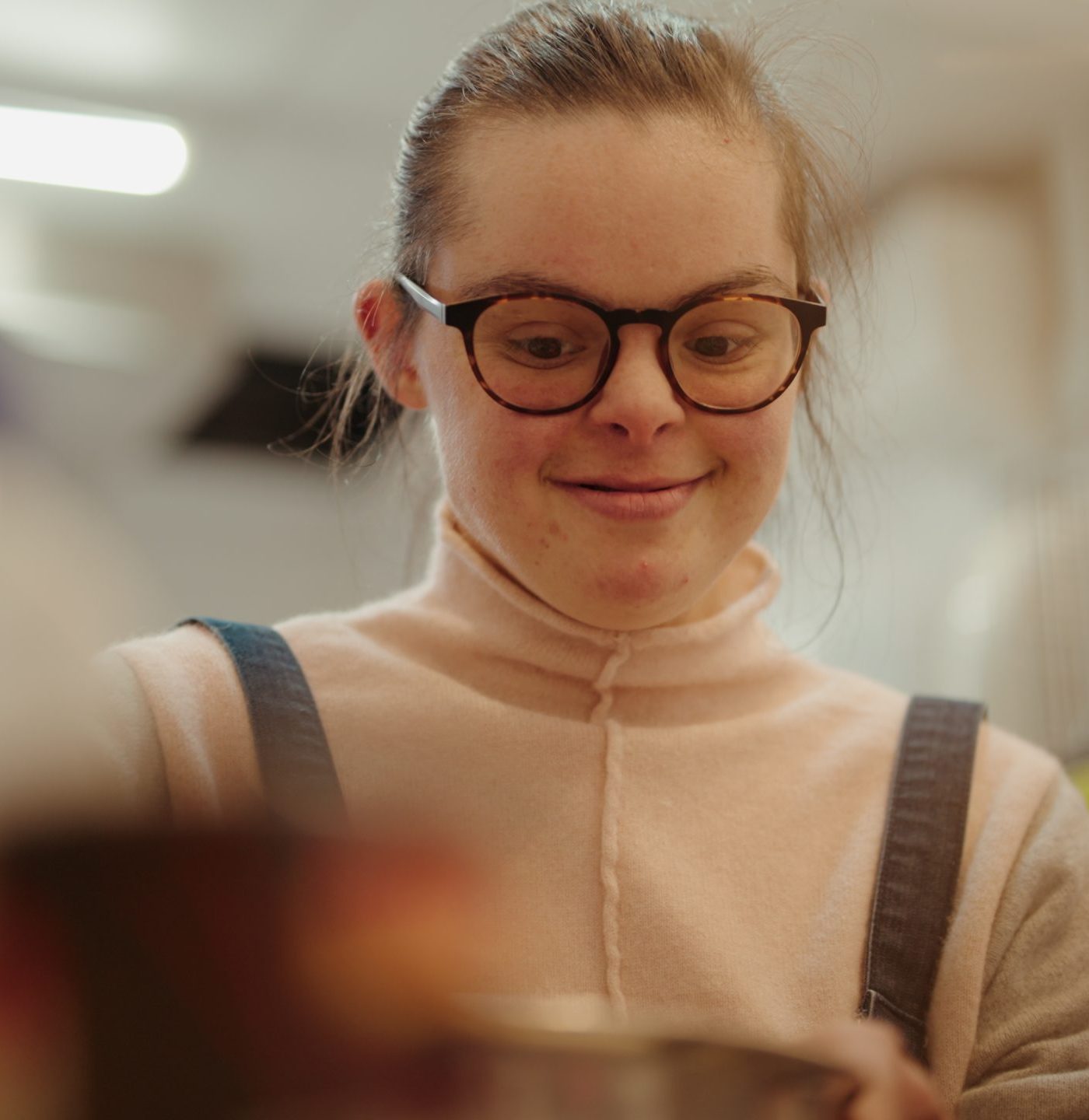 A happy volunteer in our Harrogate cafe